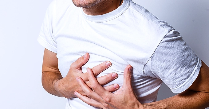 A man having chest pains | Trainest