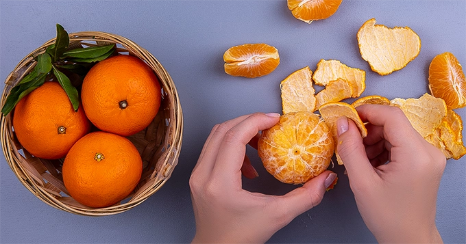 Someone peeling an orange | Trainest