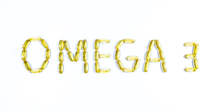 Softgel capsules forming the word "Omega-3" | Trainest