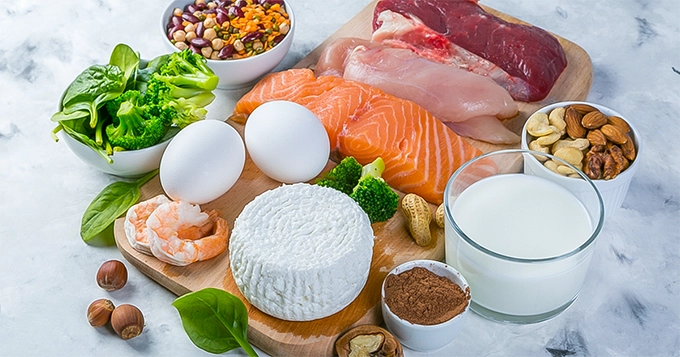 A table full of protein-rich foods | Trainest