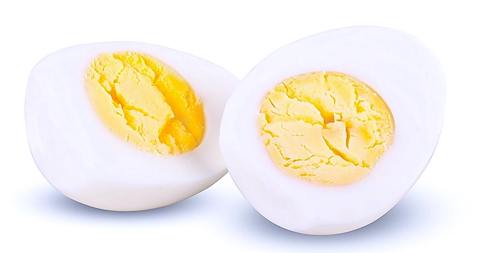 A sliced hard-boiled egg | Trainest 