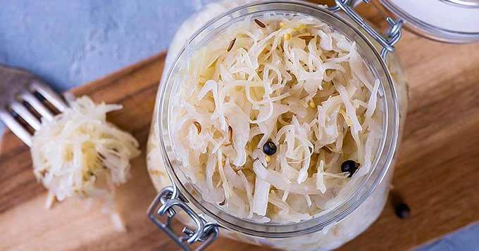 A mason jar of sauerkraut | Trainest 