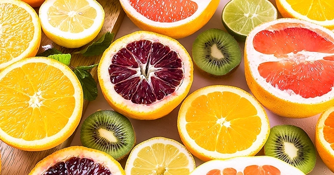 A colorful array of citrus fruits rich in Vitamin C | Trainest
