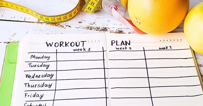 A workout plan with columns showing days of the week | Trainest