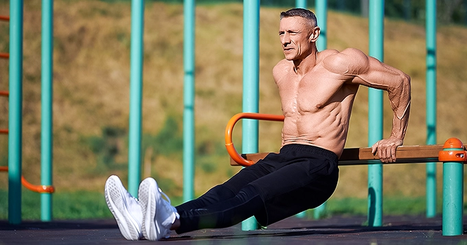 Someone doing bench dips | Trainest