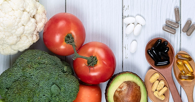 A close-up of a variety of colorful fruits, vegetables, and nuts | Trainest