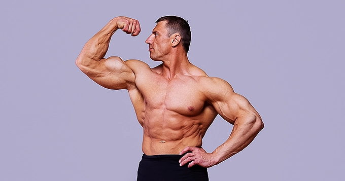 An image of a male bodybuilder | Trainest