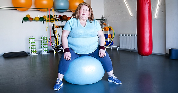 An image of an obese woman | Trainest